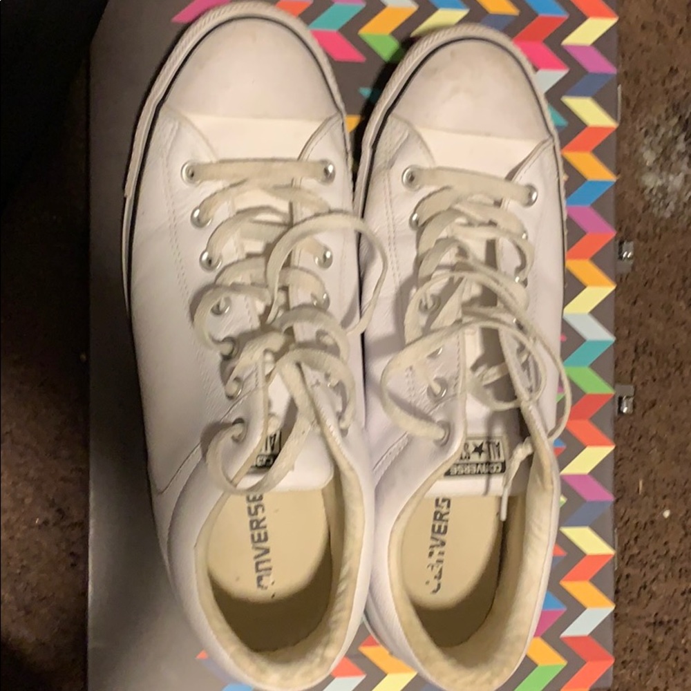 White leather converse sneakers.